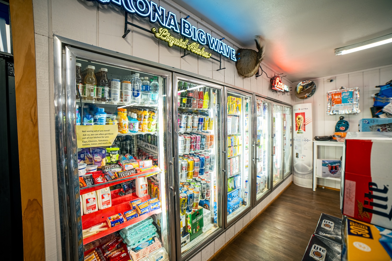 Cold cases stocked with beer, soda, water and quick-grab snacks