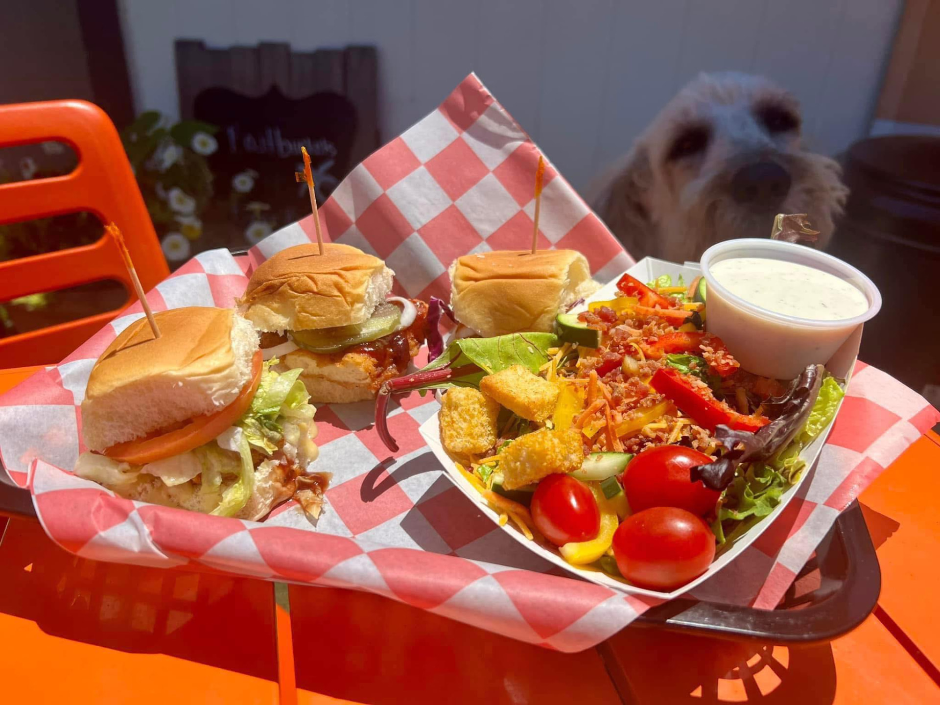 Chicken strip sliders — crispy chicken on soft buns with a fresh house salad and ranch