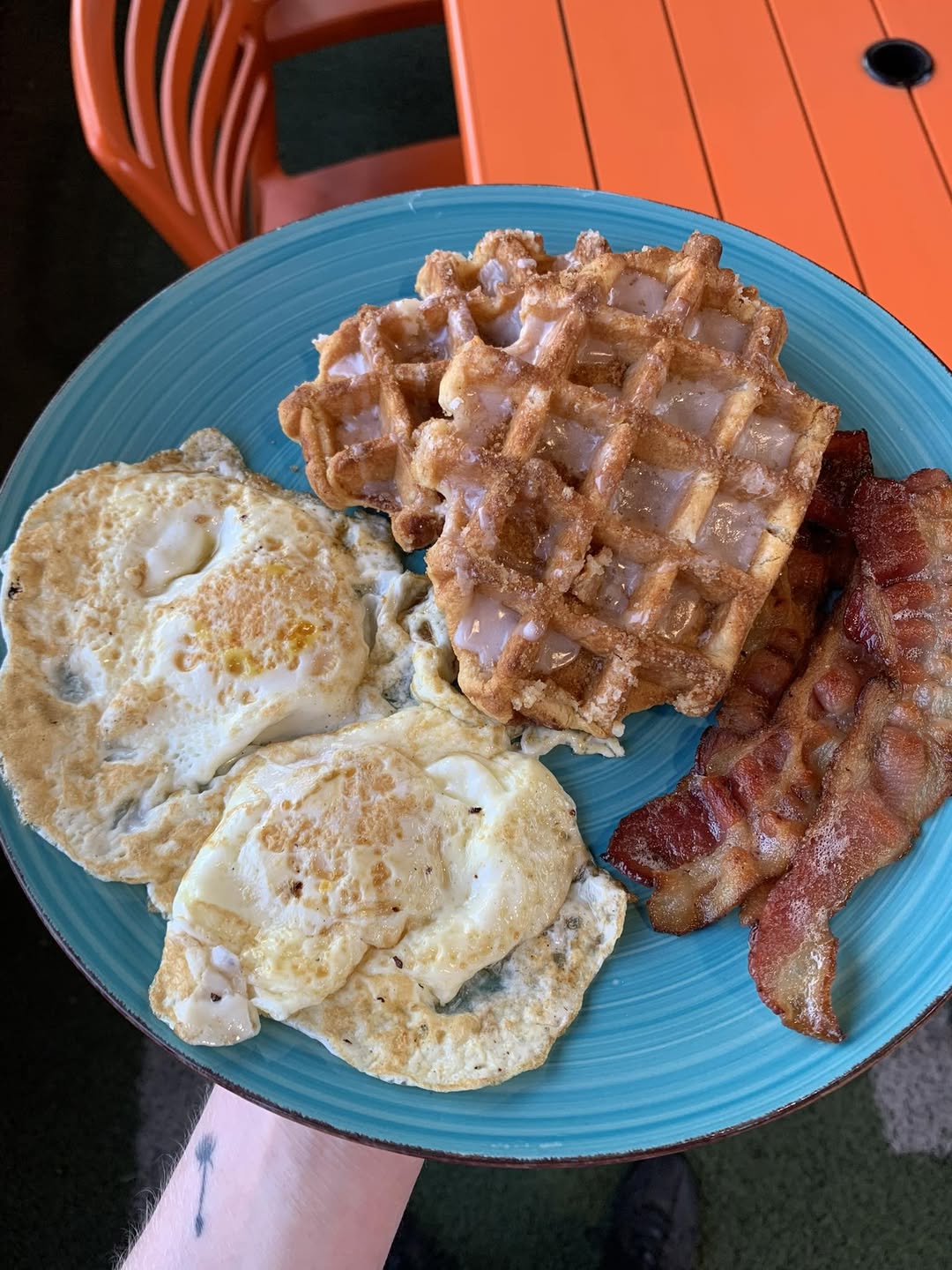 The OP Breakfast — two eggs, bacon, waffle and icing