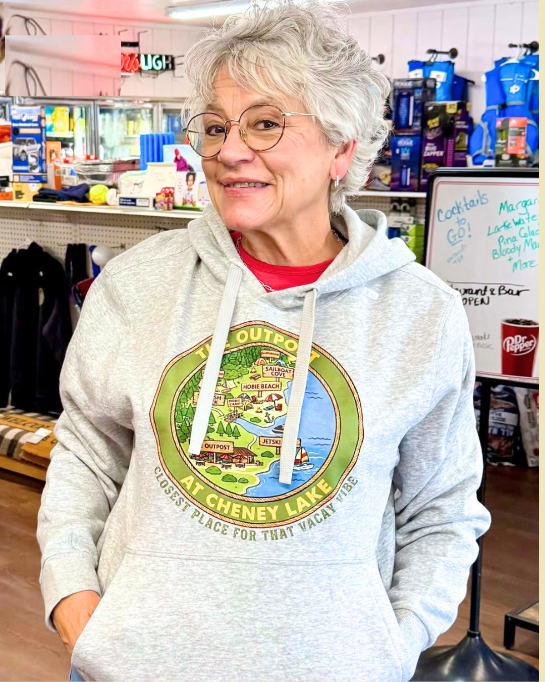 The Outpost hoodie with the lake logo on the front